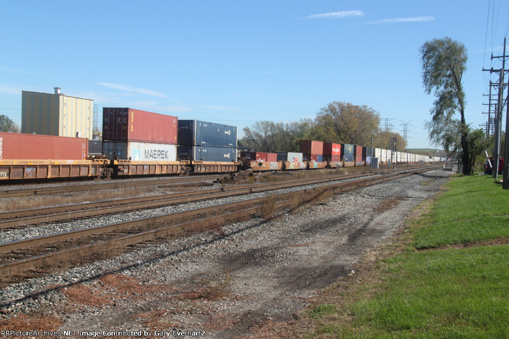 Line of container cars heading east